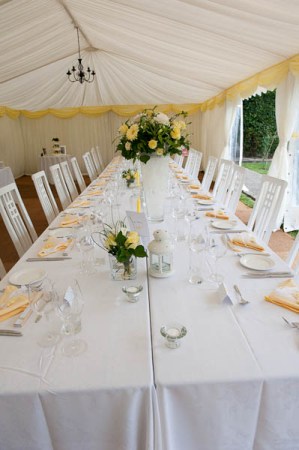 white and yellow wedding reception