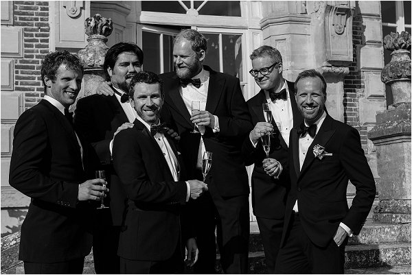 grooms in tuxedos