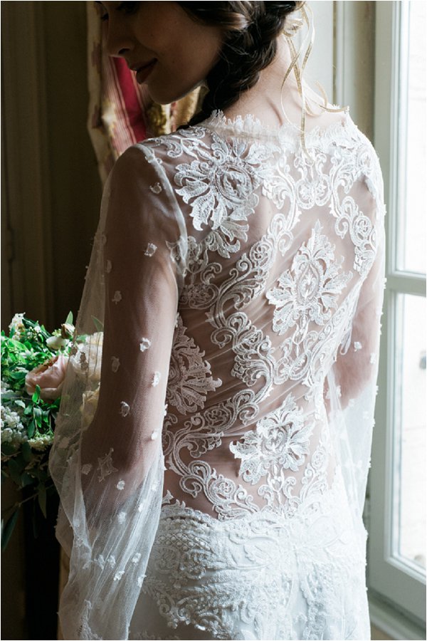 intricate lace sheer back wedding dress