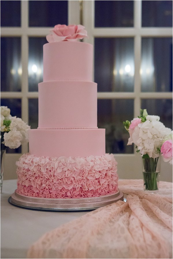 Four tiered pastel pink wedding cake