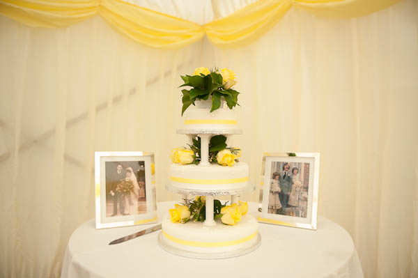 white and yellow wedding cake
