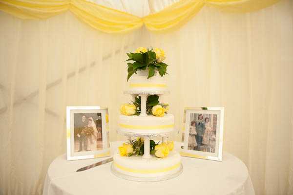 white and yellow wedding cake