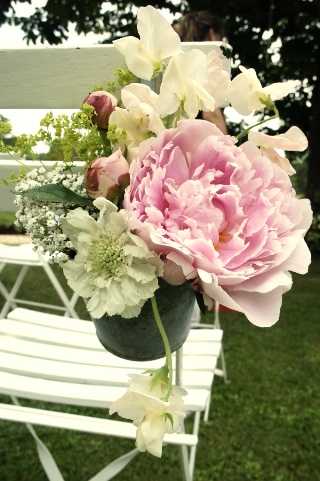 oversize flowers on chairs for aisle wedding decorations #flowers