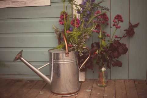 shabby chic wedding watering can © - Christy Blanch Photography