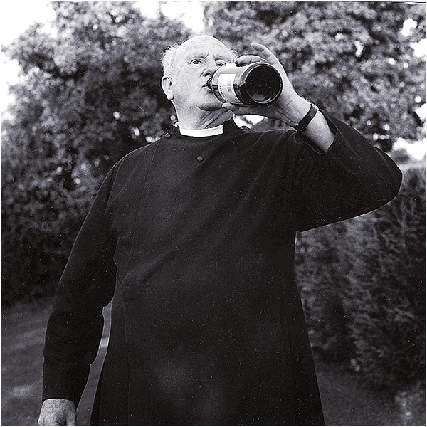 priest drinking