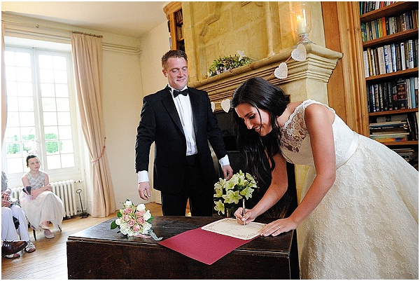 signing marriage certificate