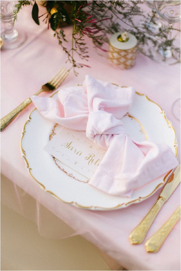 gold and pink place setting
