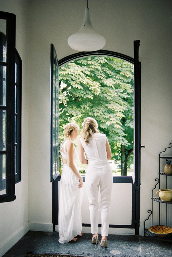 bridesmaids looking out window