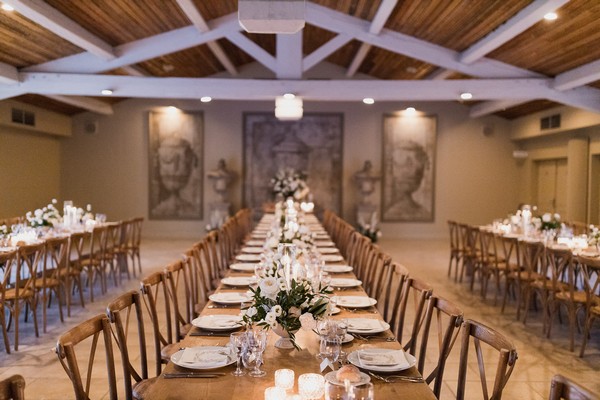 Indoor wedding reception set up, long table