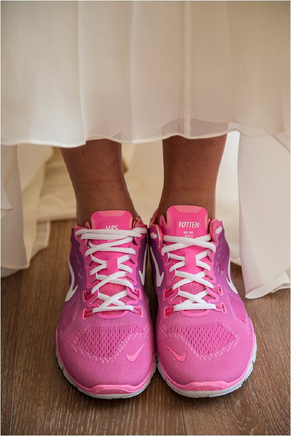 bride with pink running shoes