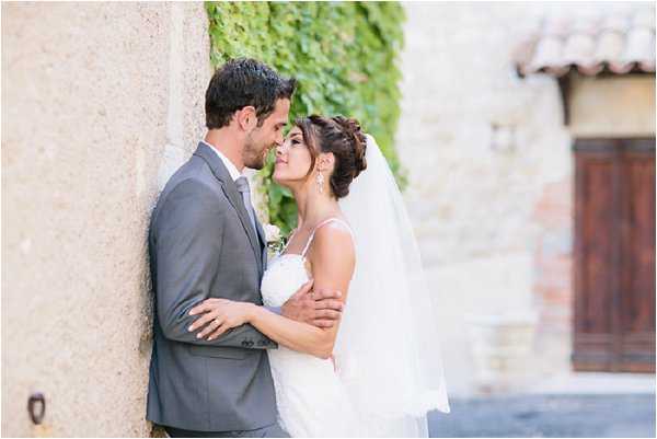 Real life Bride and Groom sharing a first kiss