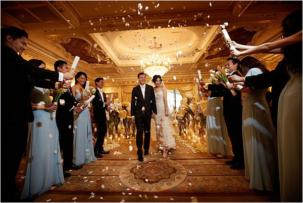 Throwing confetti over the bride and groom at Shangri-La Hotel Paris