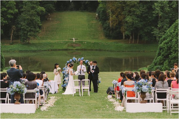 Idyllic lakeside wedding ceremony at Chateau de Baronville