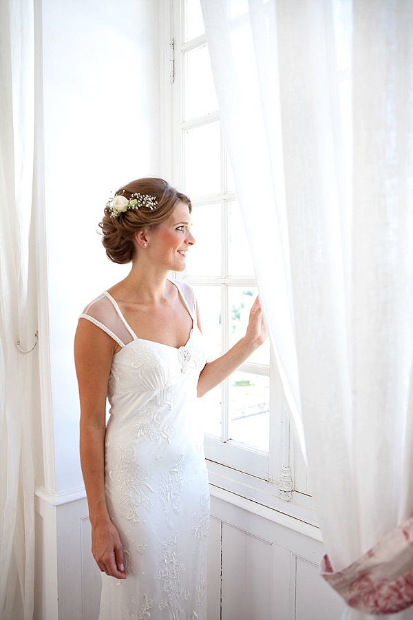 Stunning bridal window portrait