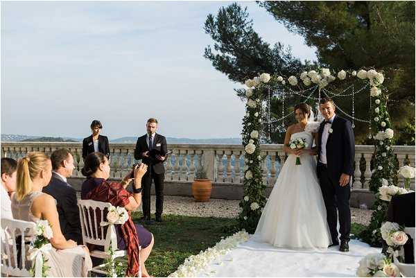 Bride and groom facing their guests after Grasse ceremony