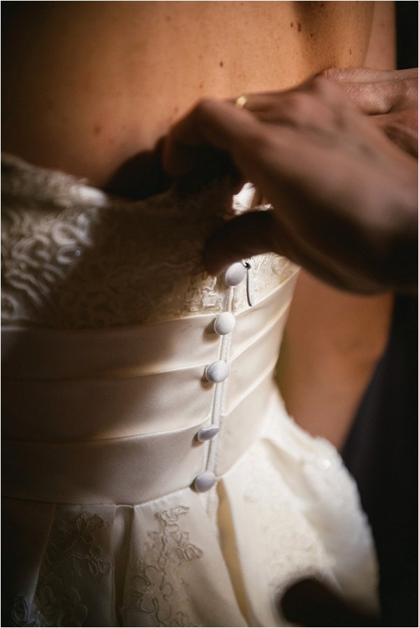 Delicate button fastening detail on La Sposa gown