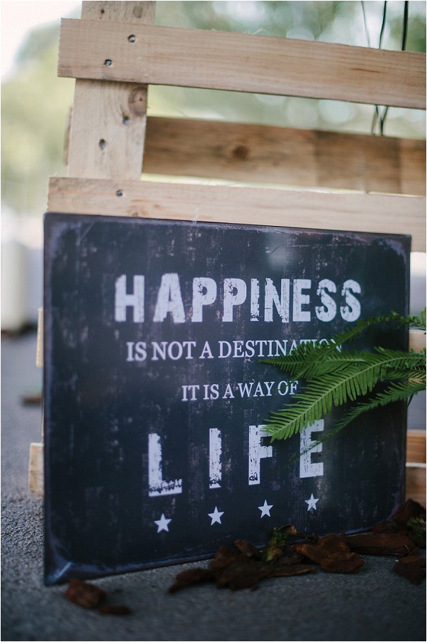 Happiness is not a destination sign