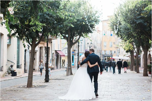 The happy couple arm in arm in central Grasse