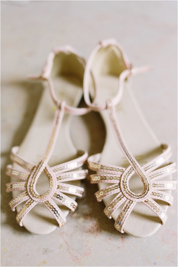 gold flat wedding shoes | Image by Maya Maréchal Photography