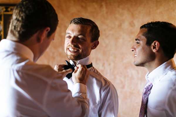 groom prep wedding photo