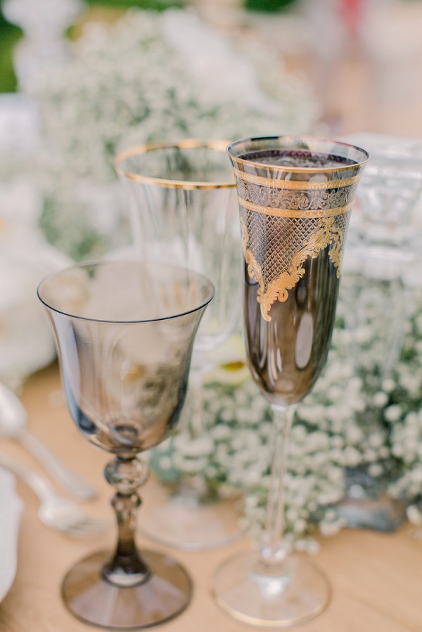 Gold accented wedding glasses
