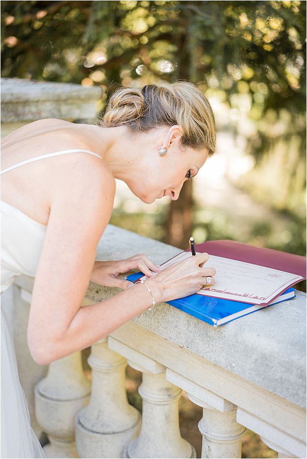 signing the marriage contract at Paris Elopement