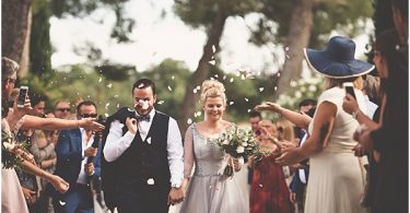 Chateau Wedding in Provence Confetti covered couple