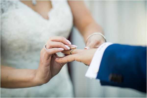 exchanging vows for a destination wedding by Janis Ratnieks Photography