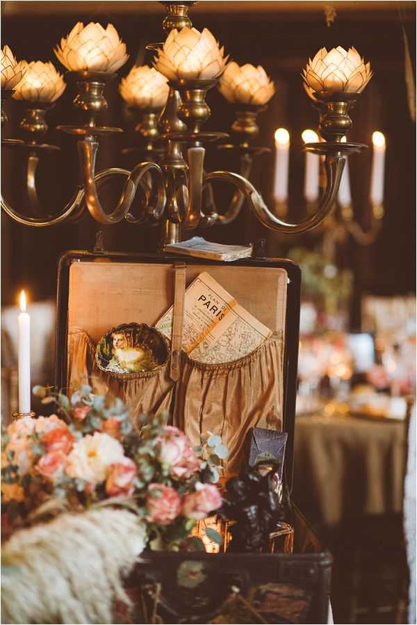 luxury vintage travel style wedding decor for a castle by Janis Ratnieks Photography