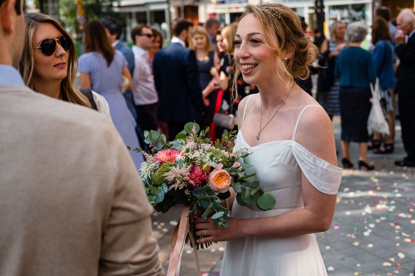 bride with floral bouquet