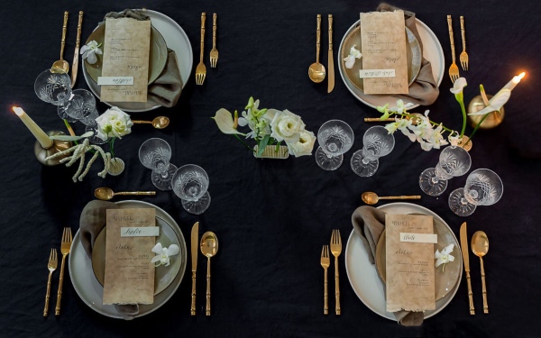 black and gold table setting