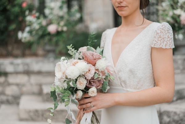 bridal bouquet with designer dress