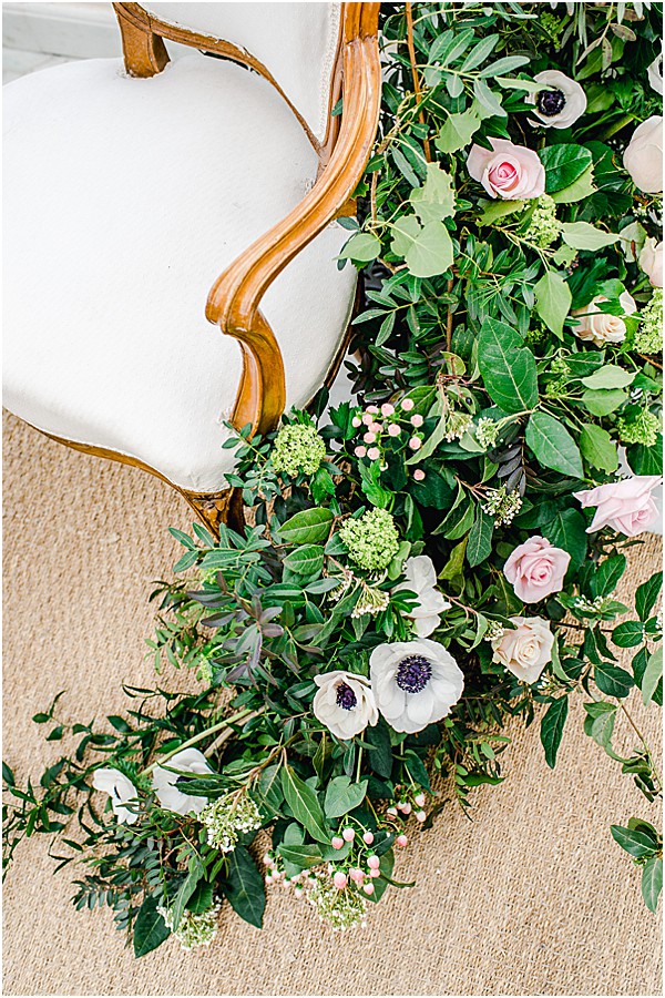 greenery and flowers at this tea party shoot