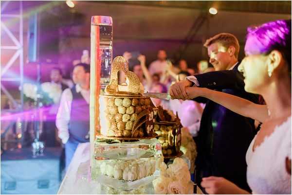 cutting a croquembouche wedding cake * Image by Thomas Raboteur