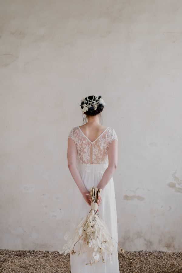 White Wedding Floral Bouquet and Lace Wedding Dress