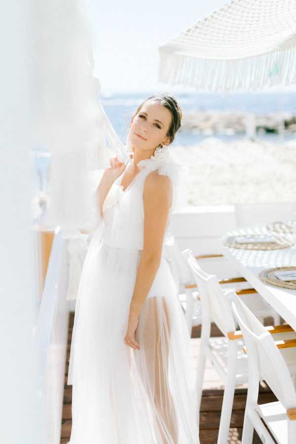 Bride in Sheer White Dress at Naos Beach in France