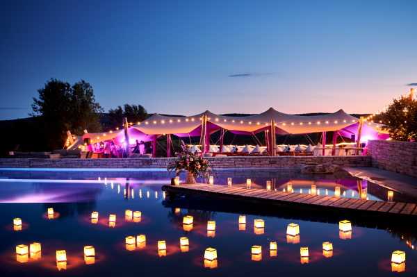 Floating lanterns in the infinity pool at Domaine de Bres