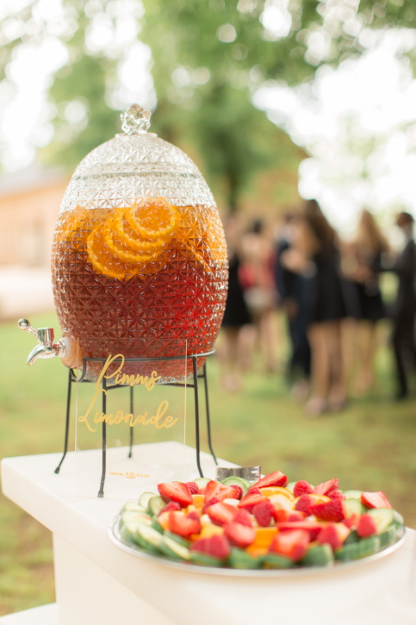 Hostess filled with Pimms lemonade for guests