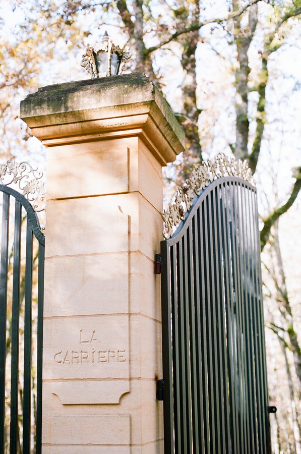 wrought iron front gate of Château la Carrière