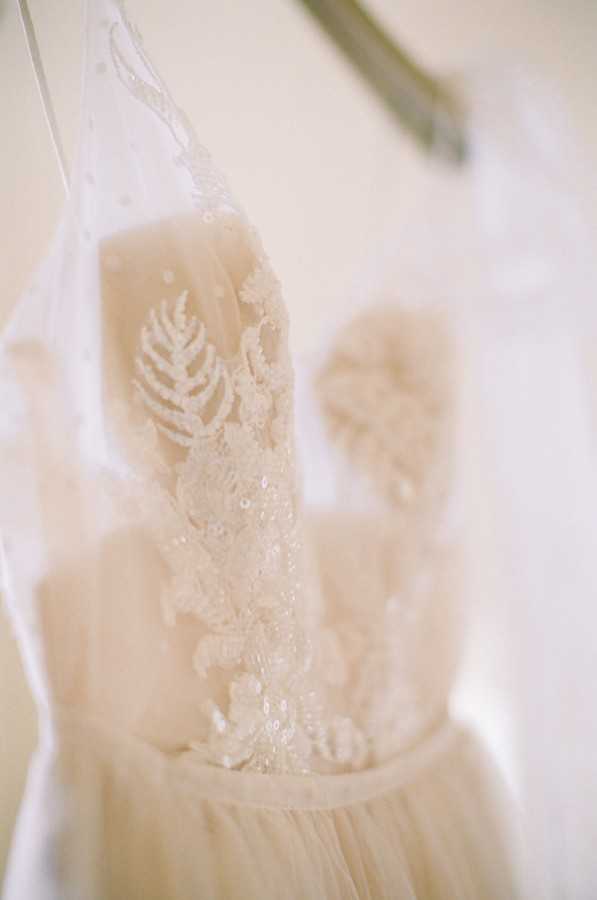 closeup of bodice of beaded wedding dress