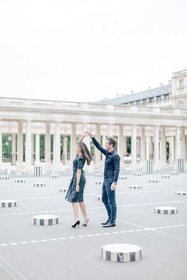 Marine & Guillaume Louvre Palace Engagement Picture 1