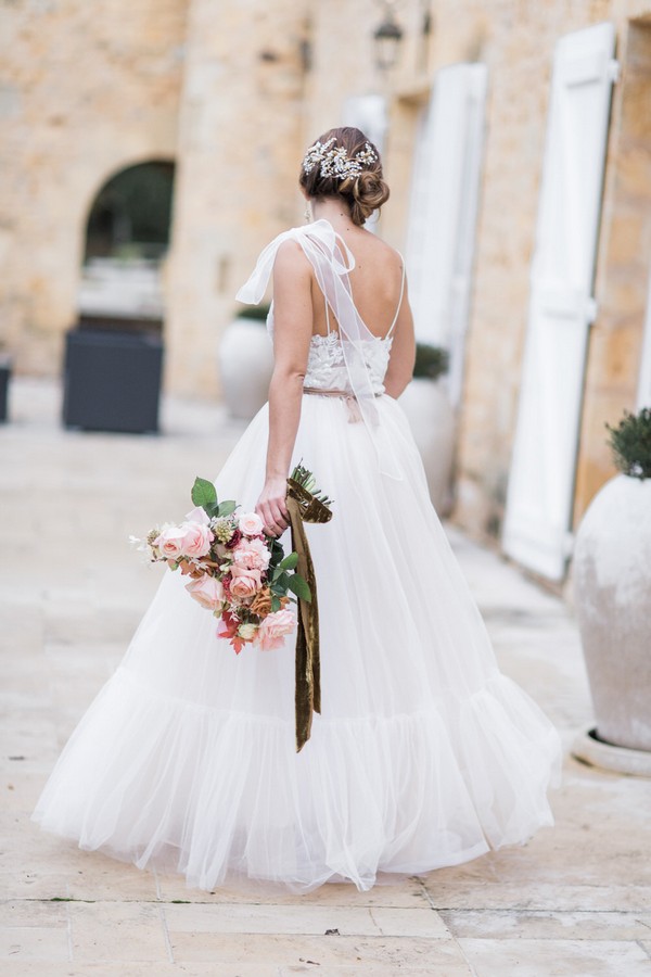 back of brides dress with bow shoulder detail