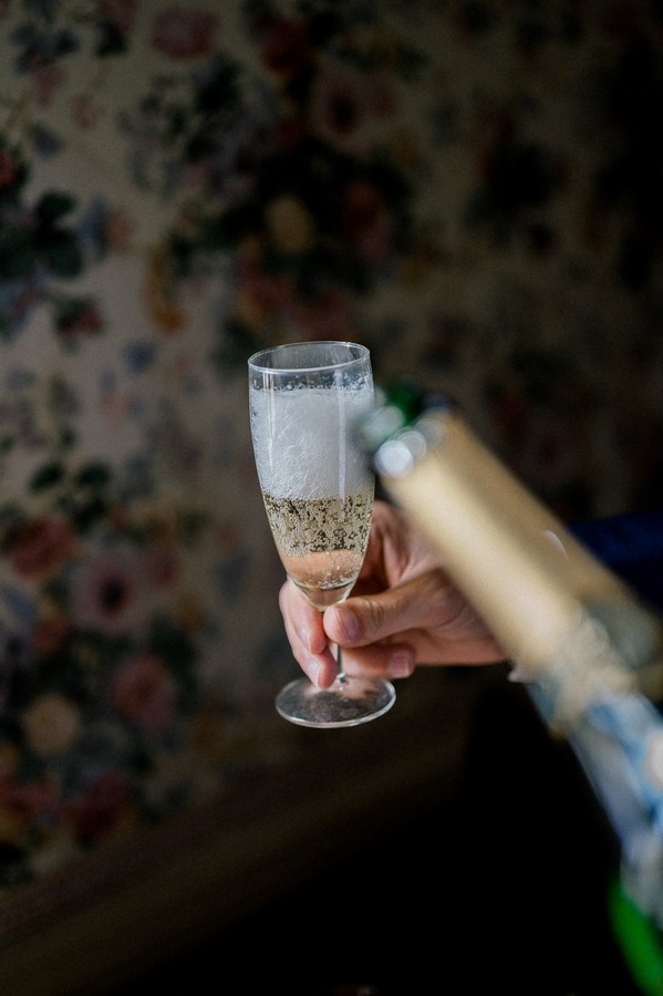 Glass of champagne being poured
