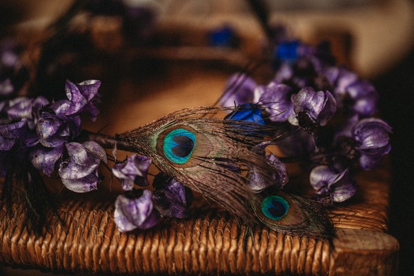 peacock feather and purple flower bridal crown