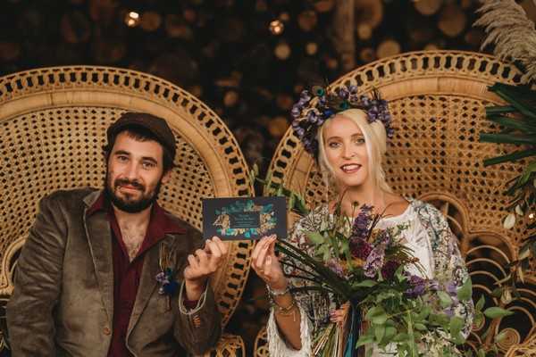 bride and groom on woven rattan peacock chairs