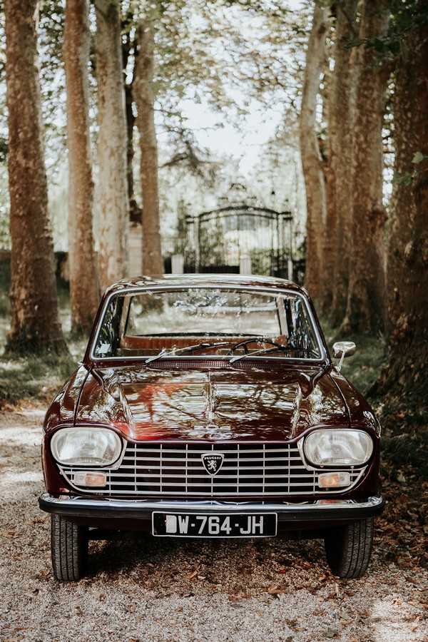 red vintage wedding car