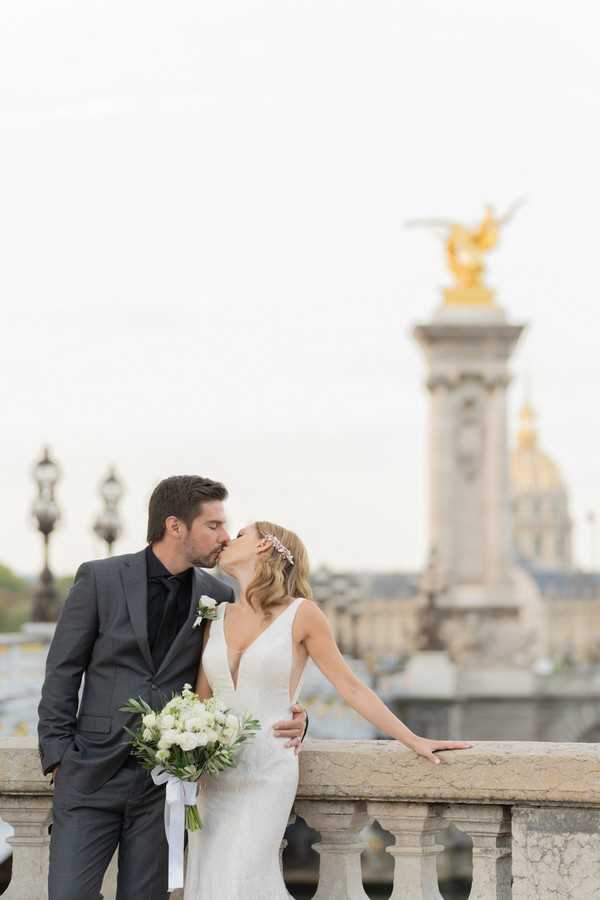 bride and groom share a kiss 