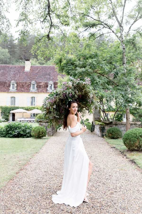 Woman With A Parasol Made of Flowers and Leaves for Monet Inspired Garden Wedding in France