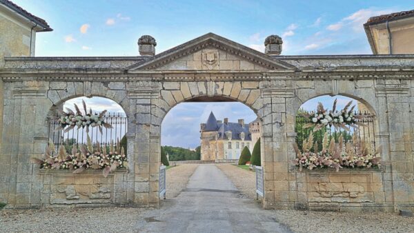 entry gate to chateau de la roche courbon wedding venue