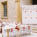 Outdoor wedding reception with white and red